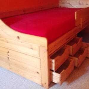 Kinder-, Jugendbett mit Stauraum aus Echtholz Kiefer
