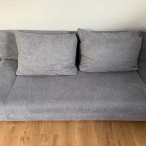 Sofa in dunkelgrau mit Bettfunktion und Stauraum
