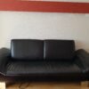 Echtledersofa mit verstellbaren Armlehnen