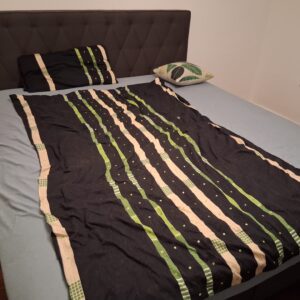 Zwei Schlaraffia Betten inkl. Matratzen und Matratzentopper, als Einzelbetten und Doppelbett verwendbar